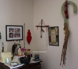 Hearth Keeper: ​This corner is next to my main entrance and is dedicated to Household Gods and Spirits. Hestia's shrine is on the left and the crocheted serpent on the right represents my home's Agathos Daimon (House Spirit).
